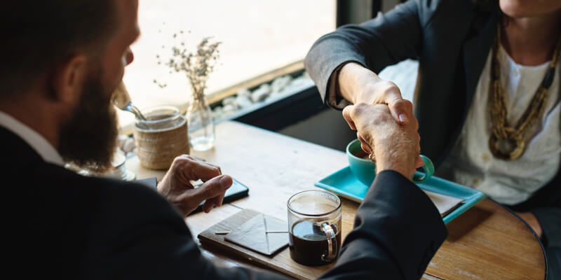 Business Handshake signifying how to make or update your will