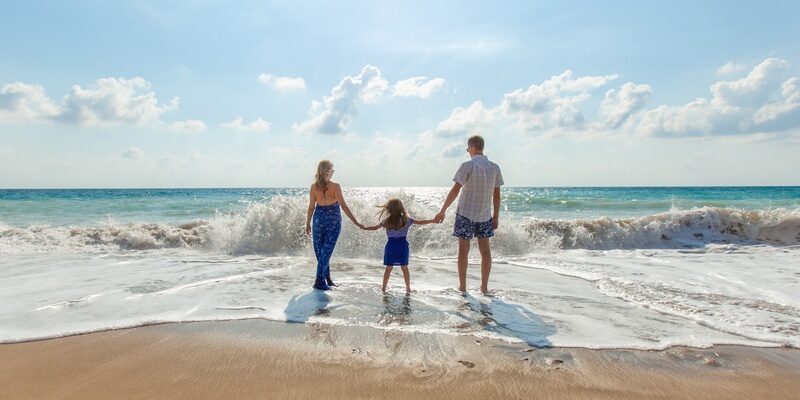 Family on the beach symbolising family mediation
