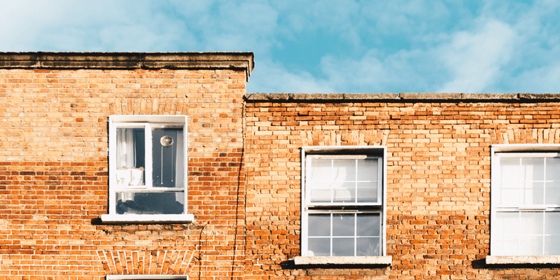 Old Brick Style Housing with Windows