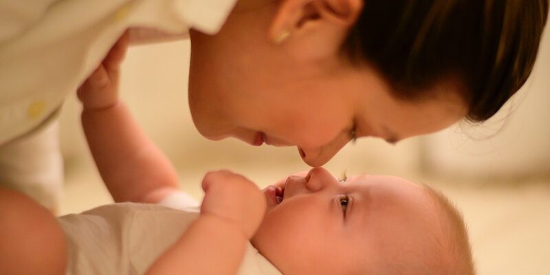 Mother and baby signifying maternity leave