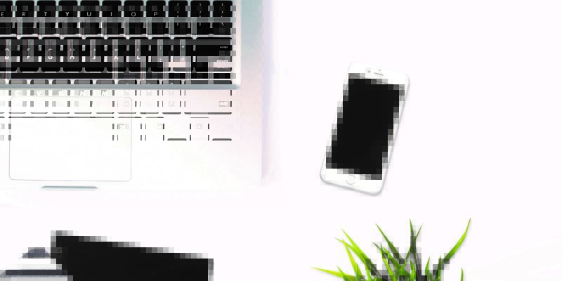 Picture of laptop and iPhone symbolising cybercrime