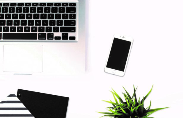 Picture of laptop and iPhone symbolising cybercrime