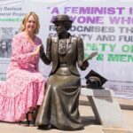 Kim Peacock with Emily Davison memorial statue. Credit: Rachel Thornhill