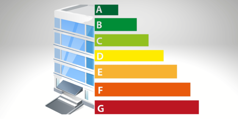 MEES Energy rating chart next to illustration of commercial property.