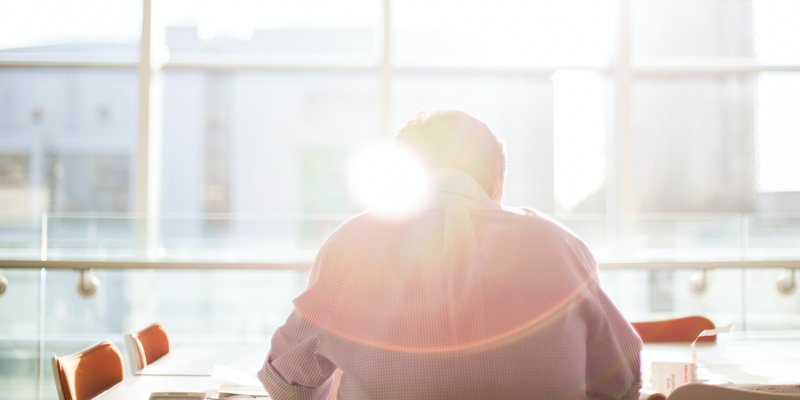 Employee in office pictured from behind signifying employment law updates.