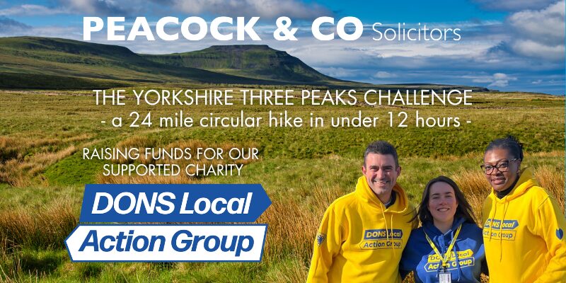 Yorkshire moors landscape shot with members of Peacock & Co in Dons Local Action hoodies, supporting our charity for 2026.
